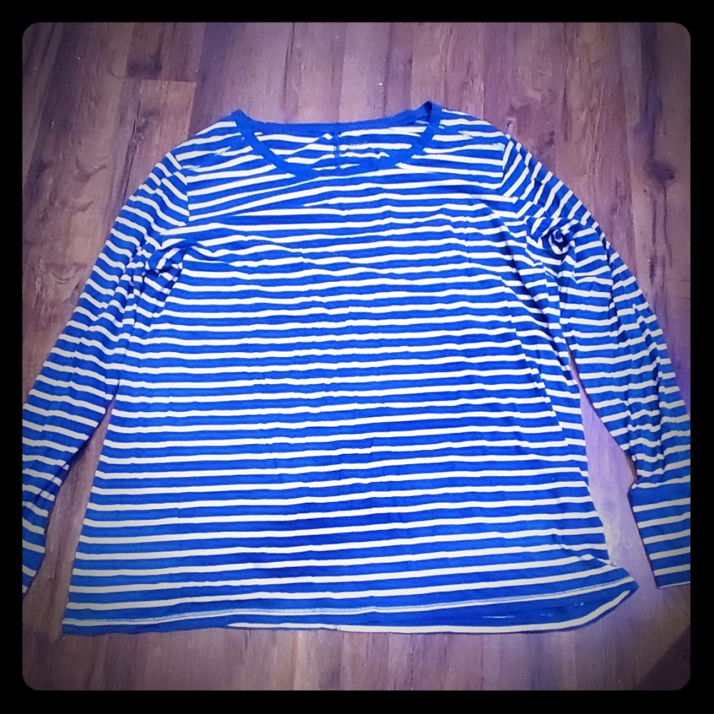 A blue and white striped long sleeve shirt